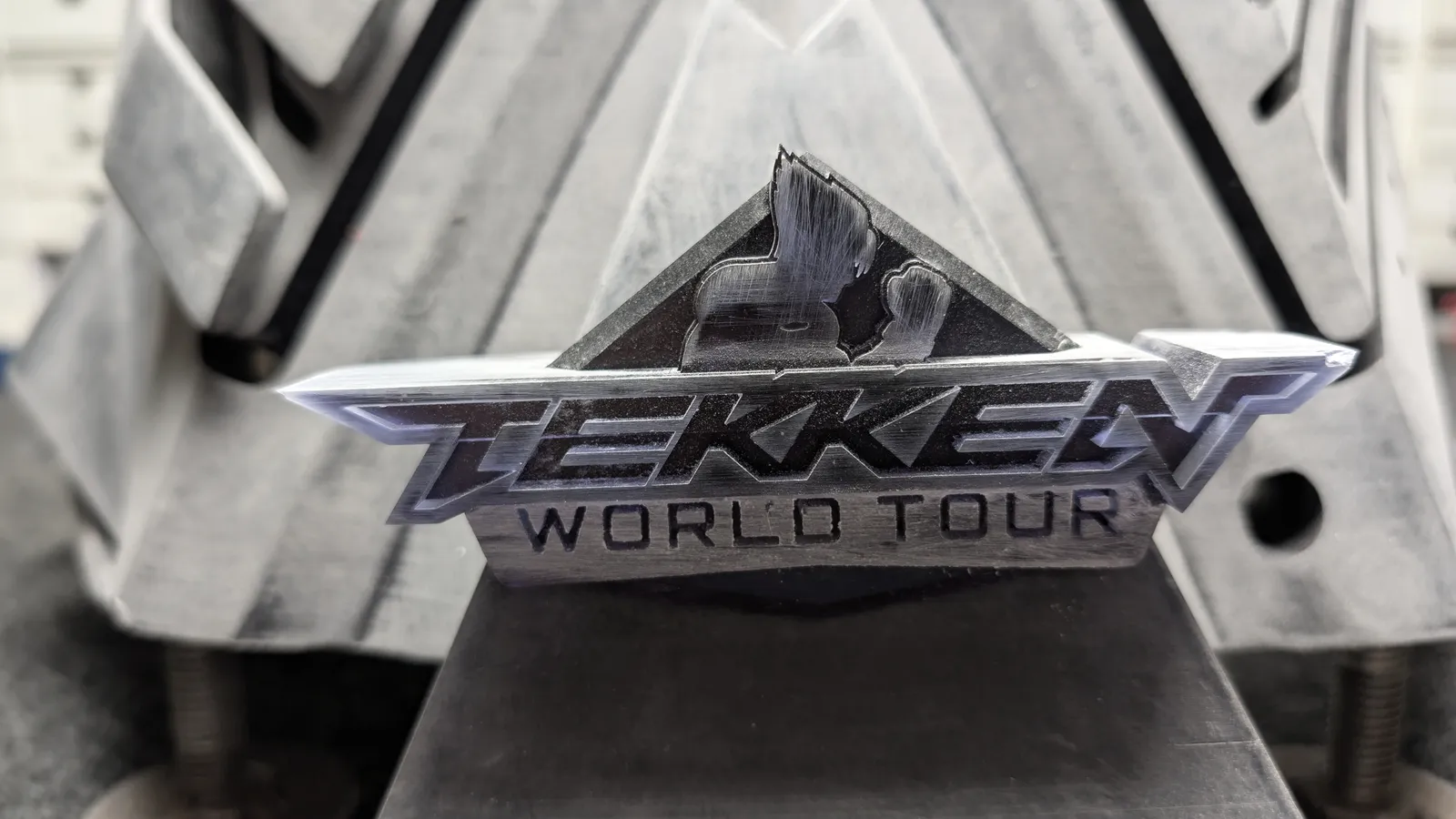 TEKKEN World Tour logo plate on the primed base of the Hoku Props trophy