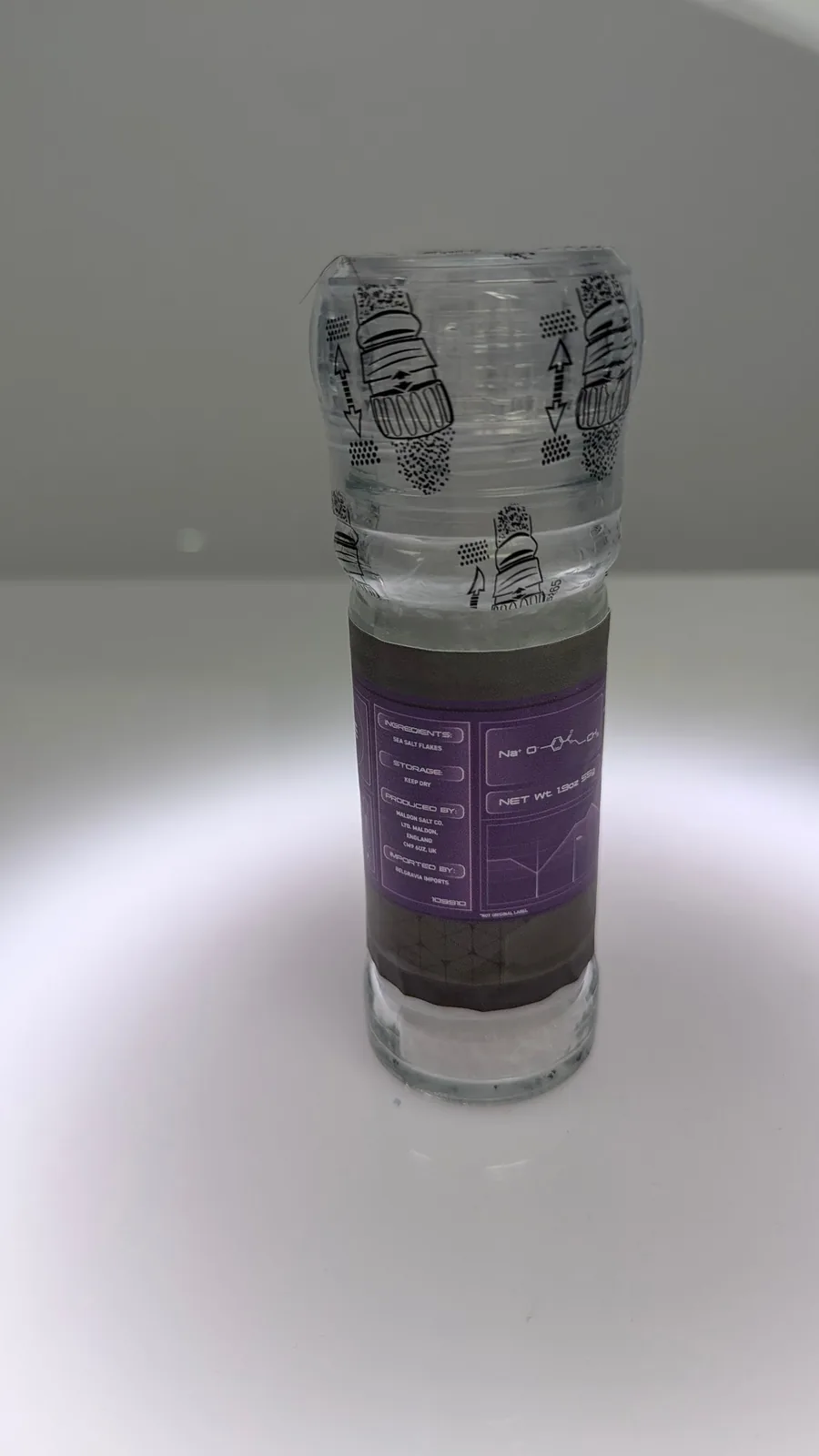 The Radianite salt grinder with its purple VALORANT label