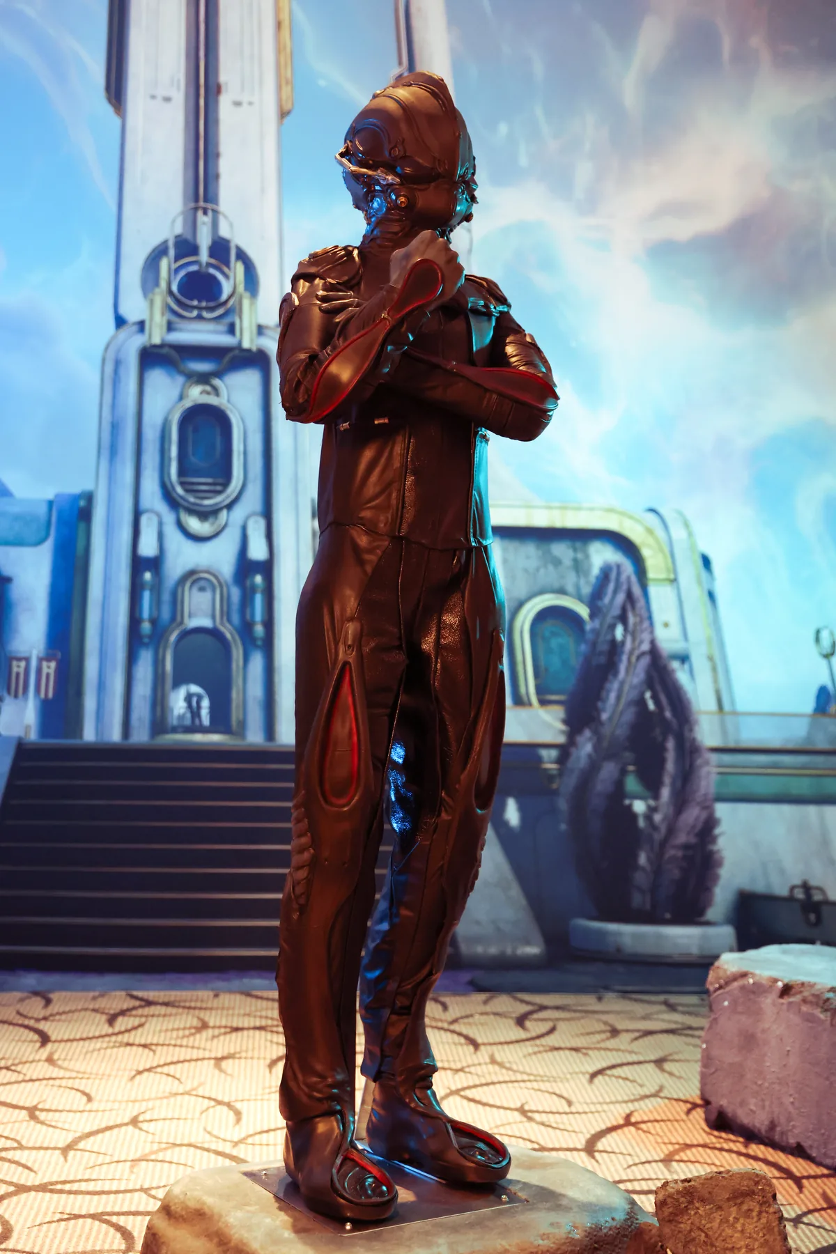 Life-size Drifter and Operator statues by Hoku Props standing on plinths at TennoCon 2025