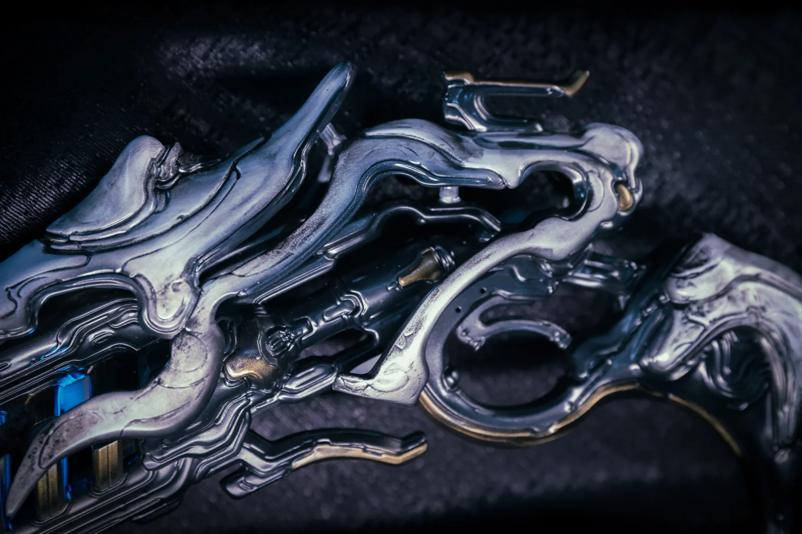Macro view of the polished chrome shell and trigger guard of the Hoku Props Sirocco