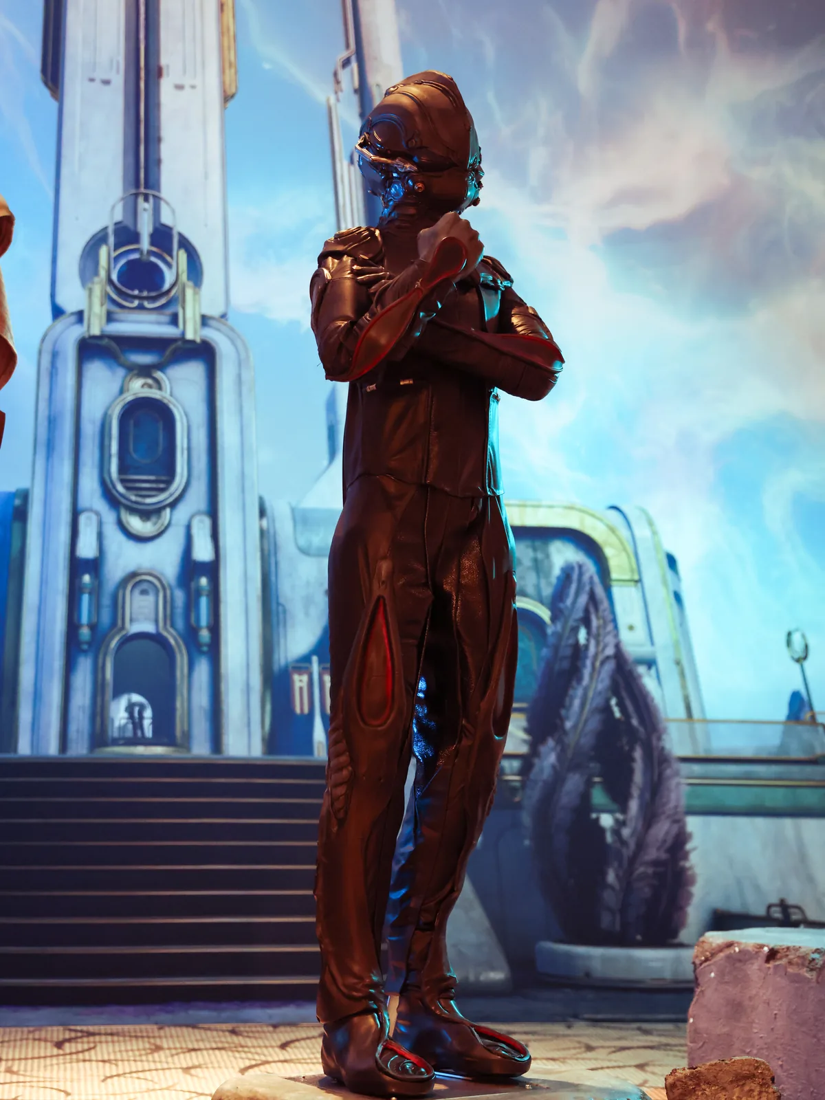 Full profile of the Operator statue by Hoku Props on its plinth at TennoCon 2025